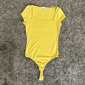 Yellow ribbed bodysuit